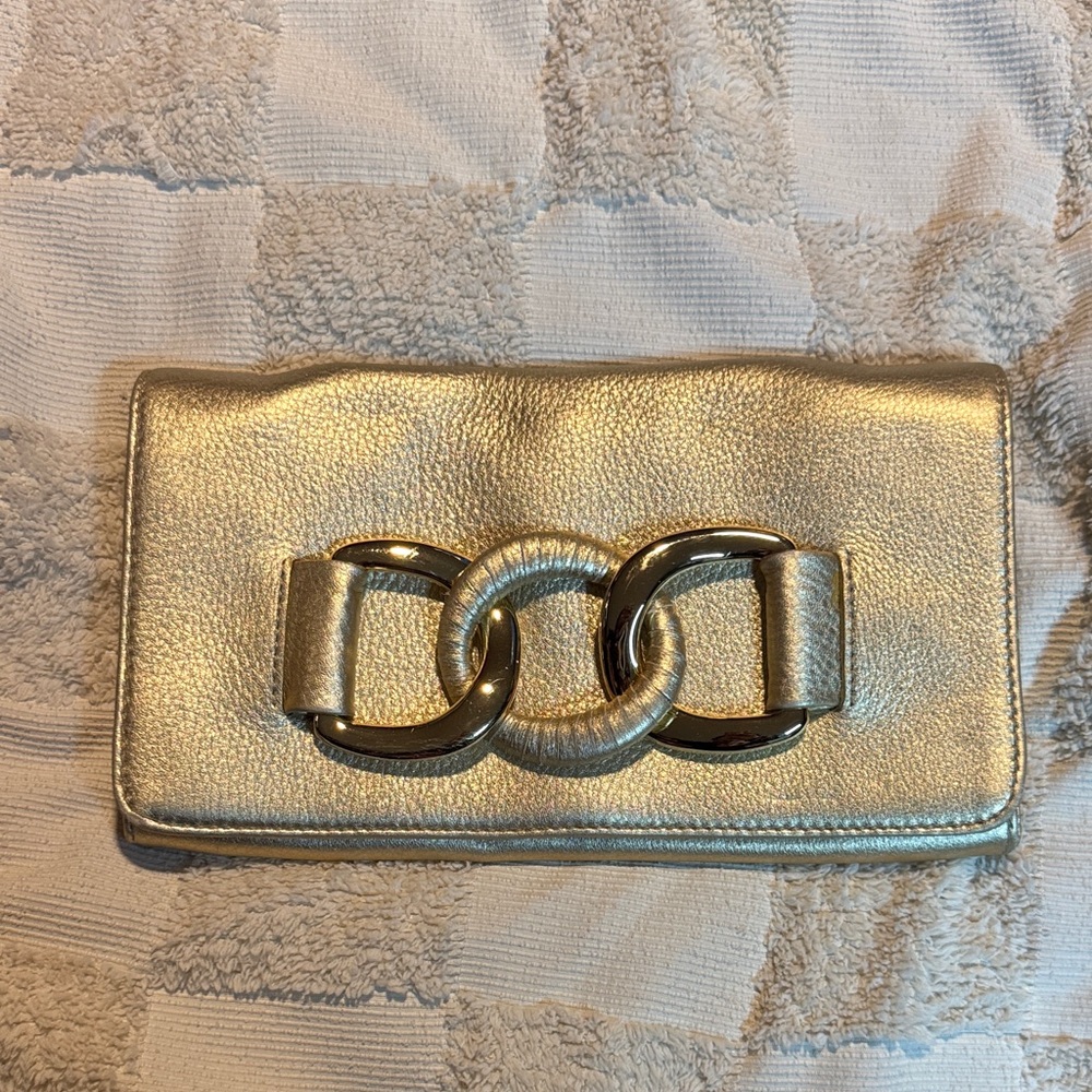 Elegant Gold Clutch with Chain Detail